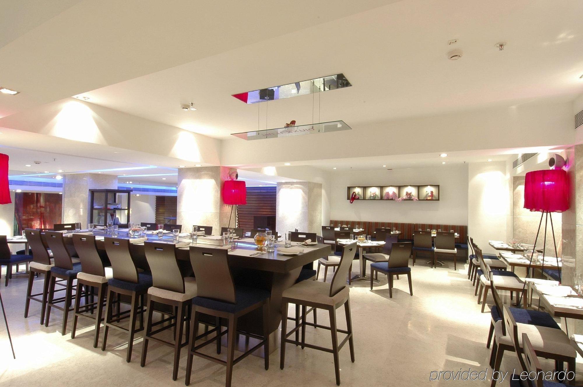 Royal Orchid Central Bangalore, Mg Road Restaurace fotografie